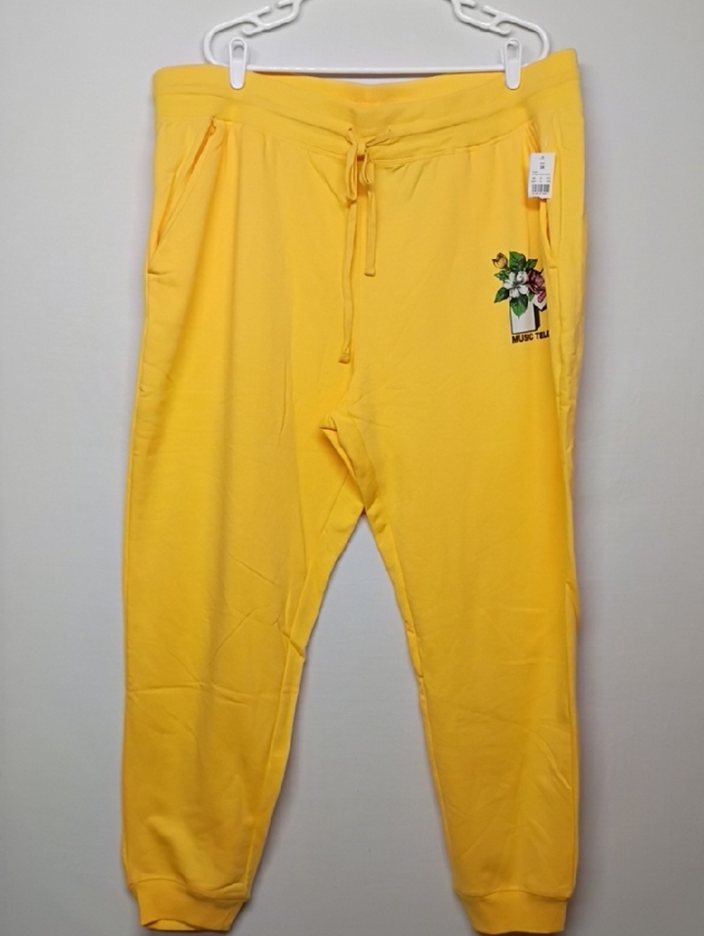 MTV Black Logo on Soft Yellow Sweatshirt Interior